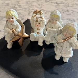 Set of four porcelain Angels.